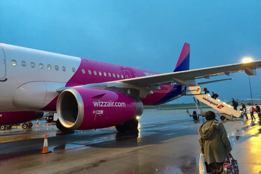 A Wizz Air flight boards at Luton Airport